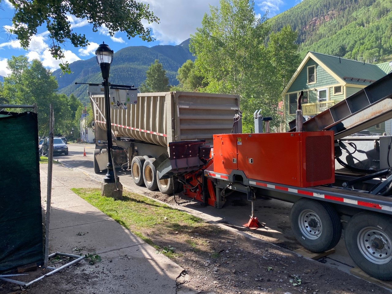TC-50 portable dirt conveyor in a neighborhood